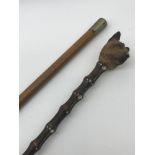 A Lot of two 19th century riding crops, One made by Swaine & Adeney London, The other has a hand