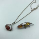 835s silver and amber pendant with silver chain together with silver 925 and amber brooch.