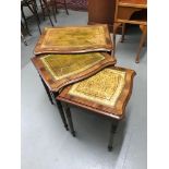 A Lot of three reproduction green leather top tables.