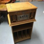 A Contemporary Record/ CD Player cabinet with record under storage unit.