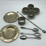 A Lot of various white metal and 800 grade silver items which includes three 800 grade spoons, 800