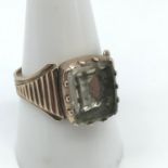 A Victorian gents gold ring set with a large clear stone, Ring size S. Weighs 4.62grams