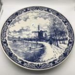 A Large blue and white Dutch wall charger made by Delft