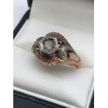 An Antique gold and white metal gents ring, designed with a single clear stone, Ring size P, Stamped