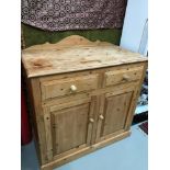 Antique style pine two drawer, two door unit/ cabinet. Measures 110x107x55.5cm