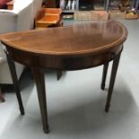 A Reproduction half moon console table