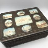A 19th century oblong ebony box, carved with floral pattern relief, with 9 Miniature paintings on