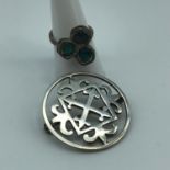 An Ortak silversmith silver brooch together with an 835 silver ladies ring set with 3 opal stones.