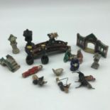 A Selection of 17th/ 18th century miniature Chinese porcelain figures, bridges and building fronts.