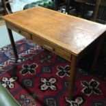 A 1950's two drawer solid oak teachers desk.