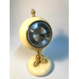 Onyx Mantel clock by Xavier of London Quartz movement, designed with gilt metal triple dolphin