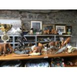 A Selection of collectables which includes fishing and hunting collectables includes Bronze