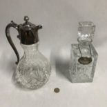 A Stuart Crystal Claret Jug together with a crystal cut decanter with Plated whisky label.