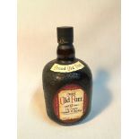 A Bottle of Grand Old Parr aged 12 years De Luxe Scotch Whisky. 1 litre bottling- 43% Vol. Full