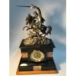 Antique slate clock designed with spelter Robert the Bruce on horse back figure to the top, Clock