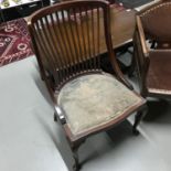 An Edwardian bow back and spindle back bedroom chair. Showing detail of single line inlay. Supported