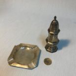 A Birmingham silver sugar shaker together with a Chester silver ashtray.