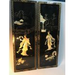 Two Vintage Chinese lacquered wall screens, detailing geisha girls made from mother of pearl.