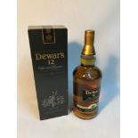 A Bottle of Dewar's 12 years old Special Reserve Blended Scotch Whisky, 1litre bottling- 40% Vol.