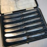 A Set of 6 Sheffield silver handle butter knives, Maker Yates Brothers and dated 1916.