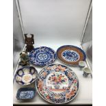 Imari style Japanese plates, with two egg cups a two small oriental dishes and two figures, one made