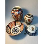 A Lot of four 19th century and later Japanese porcelain wares, which includes Imari blue and white