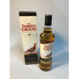 A Bottle of The Famous Grouse Finest Scotch Whisky. Full, sealed and boxed.