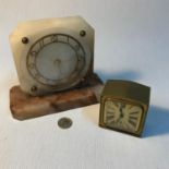 A Marble Art Deco mantle clock in a working condition together with an Antique Brevete alarm clock