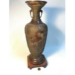 Antique Chinese bronze vase sat upon a hard wood stand, Vase details a peacock figure sat on a