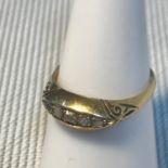 A Birmingham 18ct gold ladies ring set with 5 diamonds, Ring size M, Weighs 2.80grams
