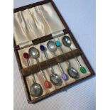 A Set of 6 Sheffield silver coffee bean spoons fitted with various coloured beans. Makers Cooper