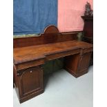 A Victorian double pedestal sideboard, fitted with interior drawers, Measures 133x207x68cm