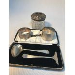 A Birmingham silver topped dressing table jar, Two various sized Birmingham silver napkin rings &