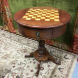 A Reproduction barrel top table, detailed with an inlaid chess board to the top, Supported on a