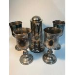 A Victorian E.P Church Communion claret jug and 4 large goblets, Jug has engraving to the front. Jug