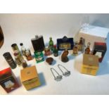 A Collection of Whisky miniatures which includes Old St. Andrews golf ball, Bushmills Malt whisky,