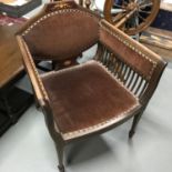 A Lovely example of an Edwardian tub chair, detailed with finial inlays and single line inlay.