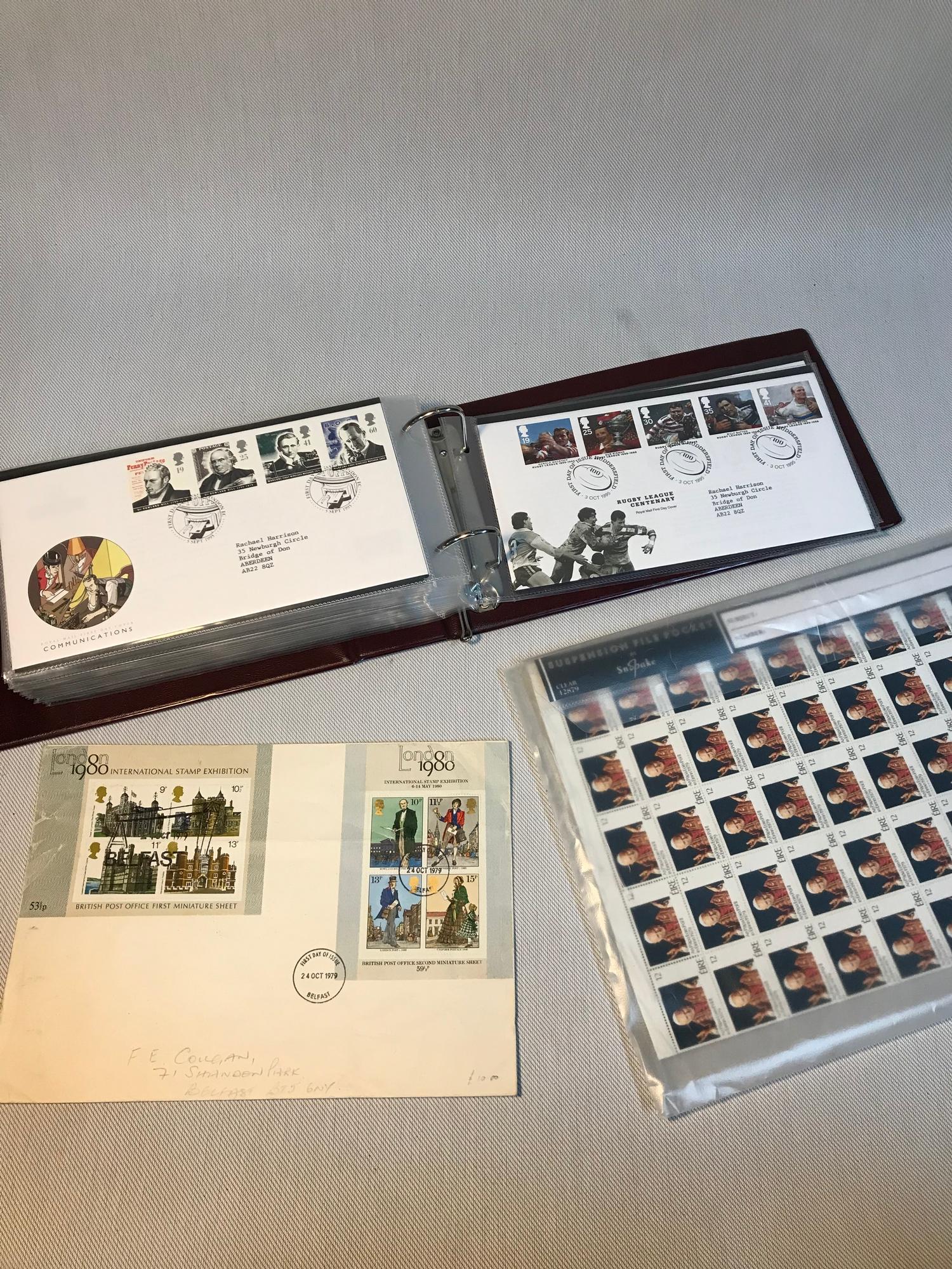 An album of first day covers together with stamps of the pope.