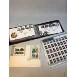 An album of first day covers together with stamps of the pope.