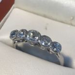 A Ladies 18ct white gold(unmarked) 5x diamond Victorian ring, Cushion cut diamonds in a rubover