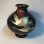 Antique Japanese lacquered bronze bulbous vase. engraved with two white metal stork figures in