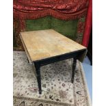 A Victorian farm house pine kitchen table with drop ends, Designed with a single under drawer,