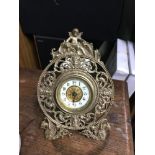 A Victorian gilt brass clock, Patd in Great Britain & France, Manufactured by The British United