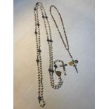 A Set of Victorian prayer beads, made from milk glass beads, silver (white metal) finished with a