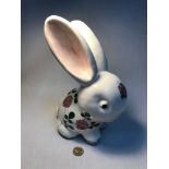 A Large Plichta London porcelain rabbit, designed with hand painted flower design, Measures 26.5cm