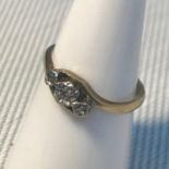 A 9ct gold, palladium and diamond stone ring, ring size K. Weighs 1.66grams