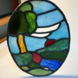 Early 20th century stain glass oval window panel. Measures 36x26.5cm