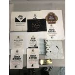 A Rare Selection of Original Marketing Proof Labels from Black & White Scotch Whisky, with