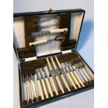 A Sheffield silver collard fork and knife set by Walker & Hall, Fitted in the same case is 6
