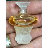 A Vintage Lalique "Les Sirenes" Perfume bottle 2001 limited edition. Measures 4.6cm in height